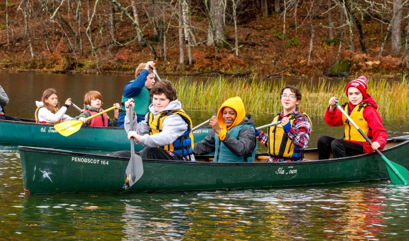 Hulbert campers canoeing.