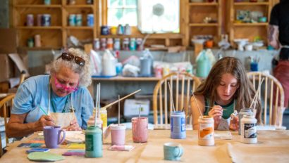Ohana campers working on art.