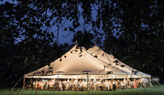 A wedding tent outside.