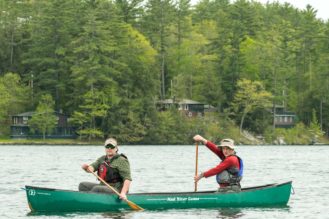 Two men canoeing.