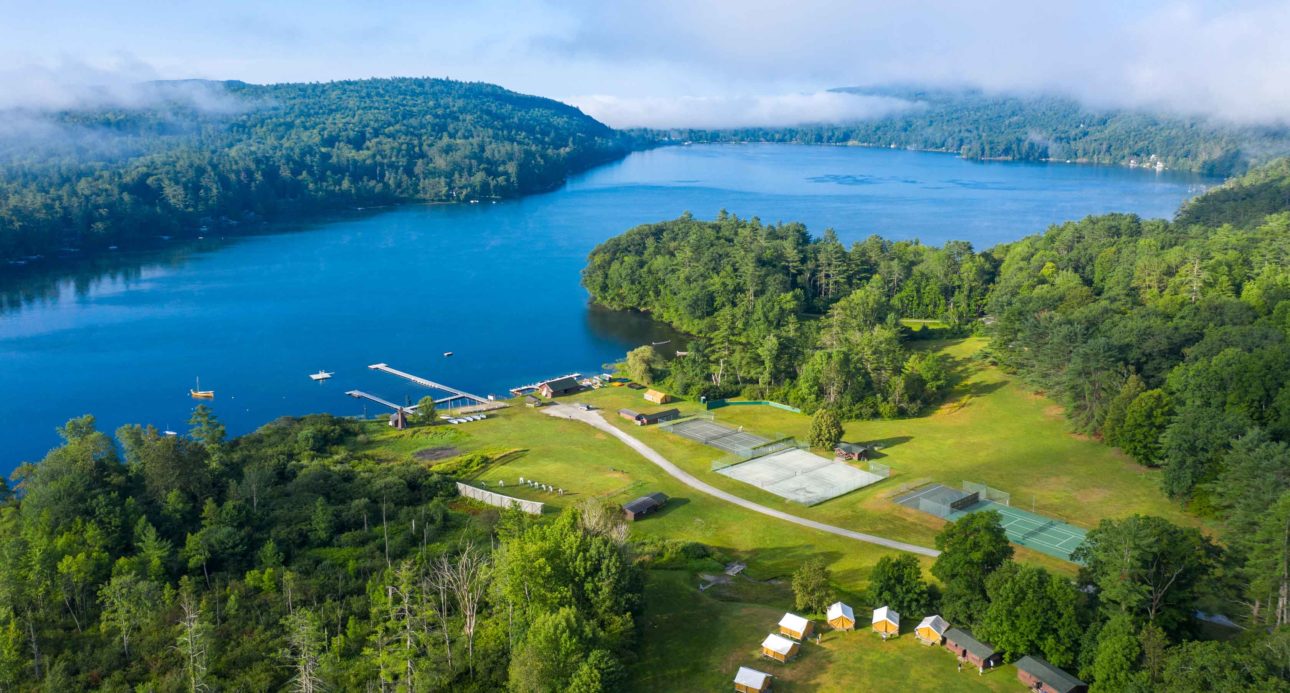 An aerial view of the camp and the lake.
