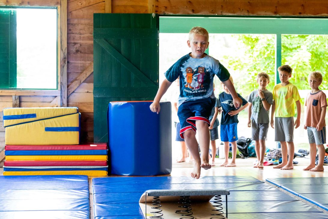 Horizons campers doing gymnastics.