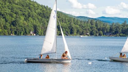A sailboat on a lake.