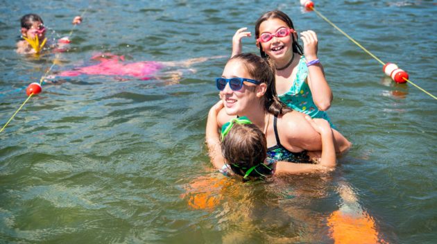 Campers swimming.