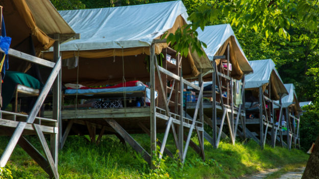A row of platform tents.
