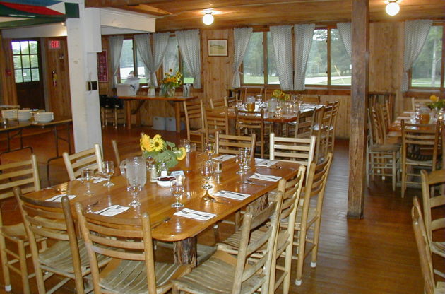 The Hulbert dining room with a set table.