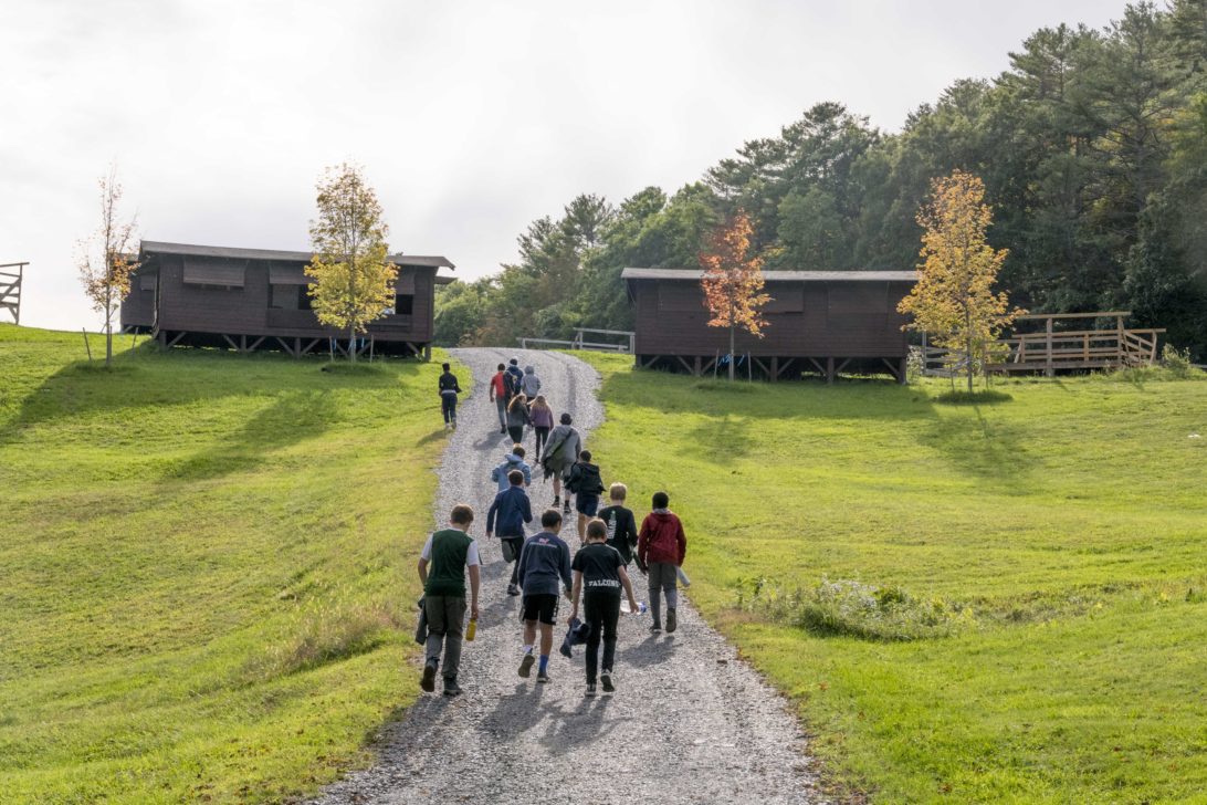 A Hulbert school group walking to their cabins.