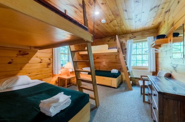Inside of Hulbert cabin with two bunk beds.