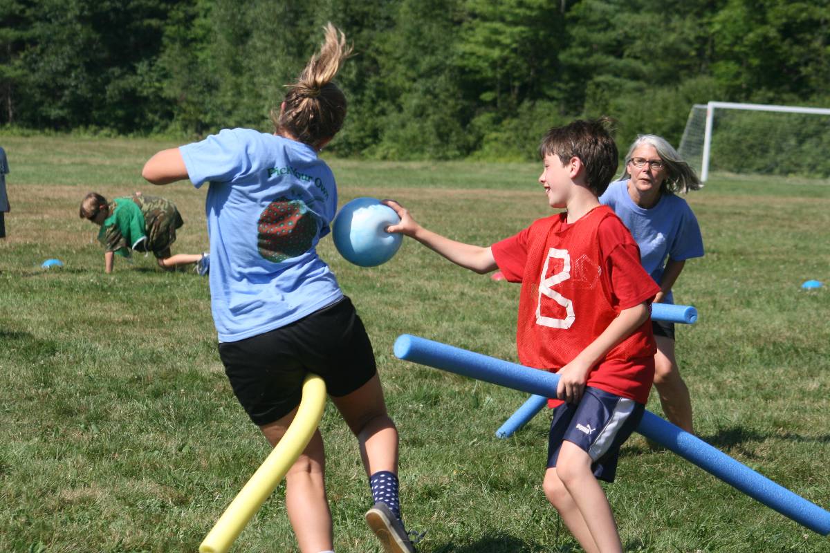 A Horizons group playing quidditch on the athletics field (played on pool noodles and dogeballs).