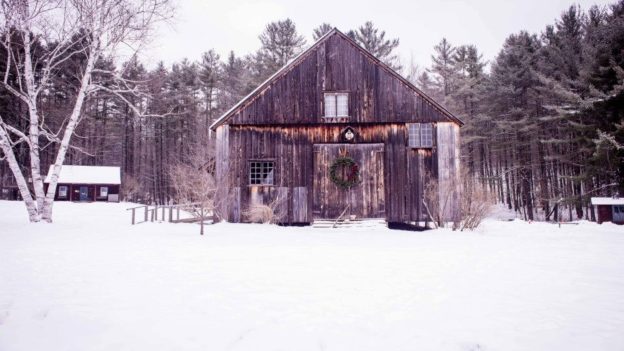 A barn during the winter.